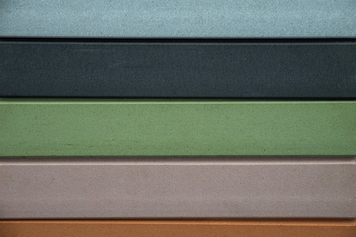 Composite wall siding panels on a modern building exterior
