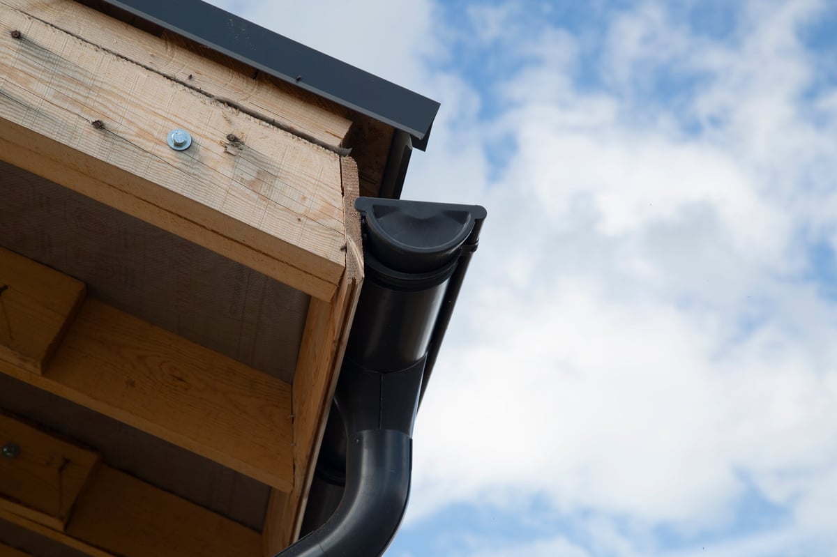 Modern residential gutter system directing rainwater along a clean roofline